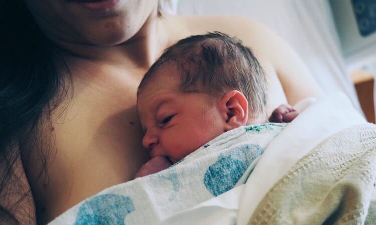 143-173261-mom-newborn-hospital-bed-1502948338