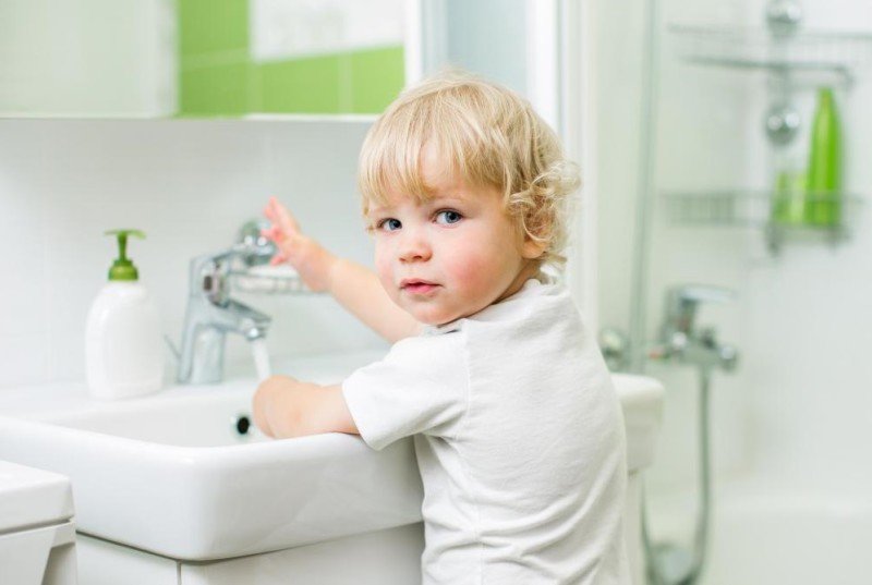 child-at-sink-washing