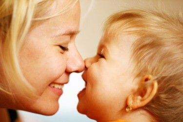 mom_son_in_smiling_nose_snuggle_-_shutterstock_3395304