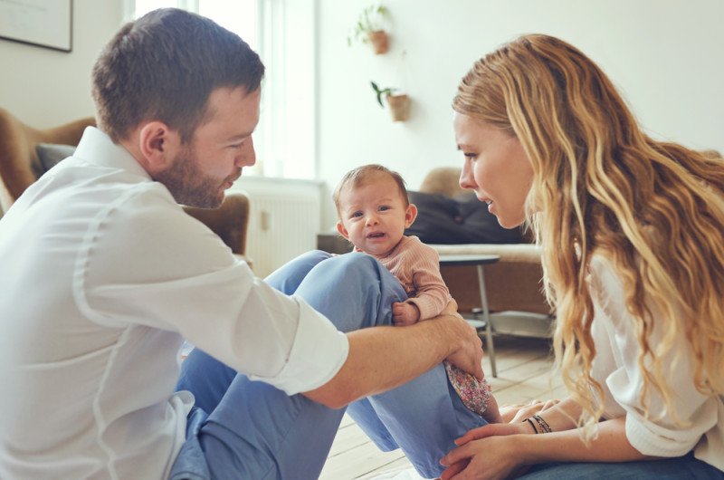 parents-and-crying-baby-at-home