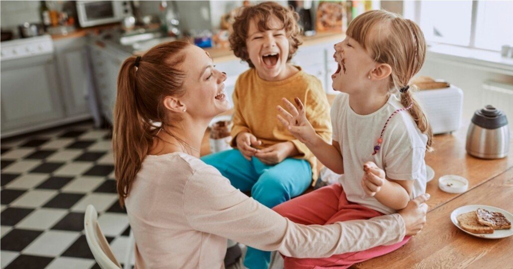 mom_laughing_with_two_kids
