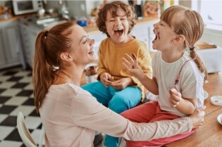 mom_laughing_with_two_kids